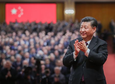 2018年12月18日，慶祝改革開放40週年大會在北京人民大會堂隆重舉行。習近平在大會上發表重要講話。這是習近平鼓掌向受表彰人員表示祝賀。新華社記者 謝環馳 攝