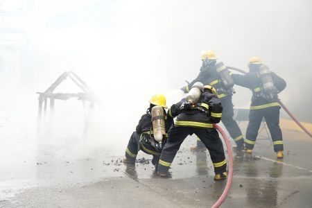 Quezon City BFP firefighters putting off a burning structure in the SM City North Edsa Fire Drill Quezon City BFP firefighters putting off a burning structure in the SM City North Edsa Fire Drill