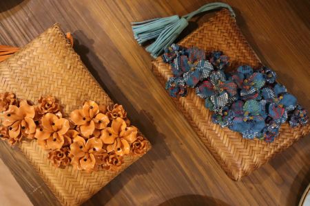 fun, fresh iconic bamboo fleur clutches featuring the colors of local flora and fauna by Matthew and Melka.