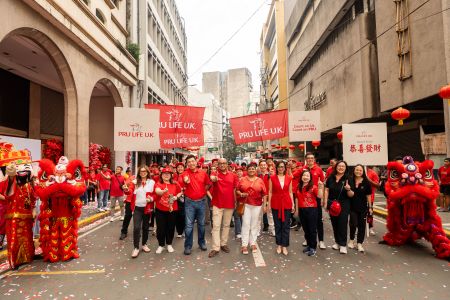 Pru Life UK President & CEO Sanjay Chakrabarty (4th from left) with wife Reena Chakrabarty (5th from left), executives, and agency leaders join the Chinese Year parade along the streets of Binondo. Pru Life UK President & CEO Sanjay Chakrabarty (4th from left) with wife Reena Chakrabarty (5th from left), executives, and agency leaders join the Chinese Year parade along the streets of Binondo.