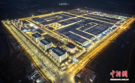 The factory of Guangxi Fudi Battery Co., Ltd. in Nanning's Eastern New Town is brilliantly lit as night falls on February 12, 2026, presenting a spectacular scene. With a total investment of 14 billion yuan, the project is built as BYD's largest global battery project. It has a 45GWh capacity for power batteries and energy storage systems and has already realized large-scale production efficiency. Photo by Zhou Jun