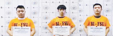 圖為涉嫌非法複製同胞信用卡而被捕的3名中國人。