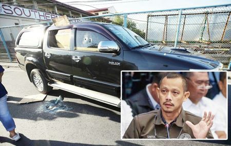圖為懲戒局法務處長仙道斯昨天在文珍俞巴市遭槍殺的現場。