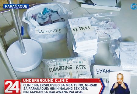 圖為國調局在巴蘭玉計市萬國村住宅區一家中國人經營的地下診所內沒收的拭子盒、處方紙、避孕套等。