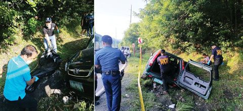 圖為菲國警反綁架組成員昨日在擊斃2名綁匪後，正抬走嫌犯屍體。