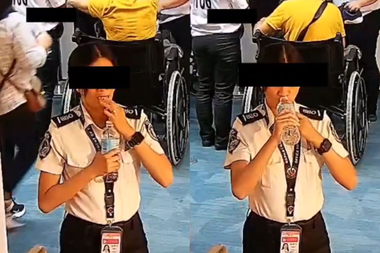圖為監控拍下的馬尼拉機場一名女安檢人員疑似吞下300美元現鈔。(視頻截圖)