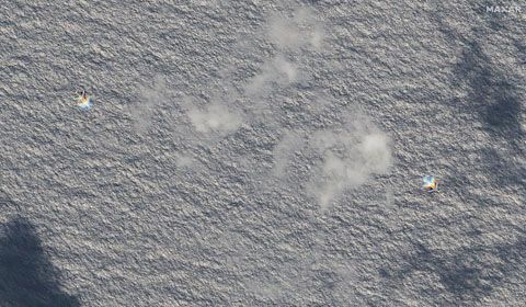 太空科技公司「馬薩爾科技」24日拍到的衛星影像顯示，有2架轟6在黃岩島東邊飛行。（路透社）